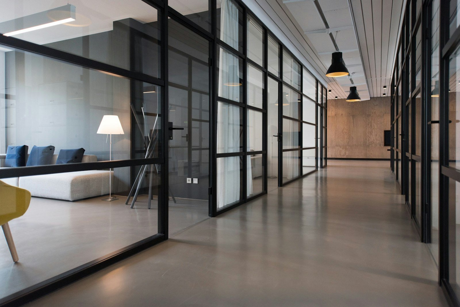 Bright contemporary workplace interior with glass and daylight